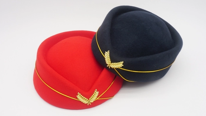 Domestic vs. International Flight Attendant Hat Customization: Key Differences You Need to Know